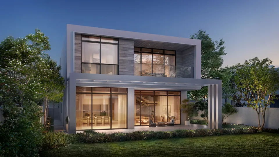 Bashayer Villas: two-storey villa with large glazed openings at dusk, developer render