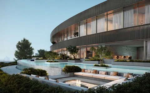 Nawayef Mansions: curved rear facade above terraced pools, developer render