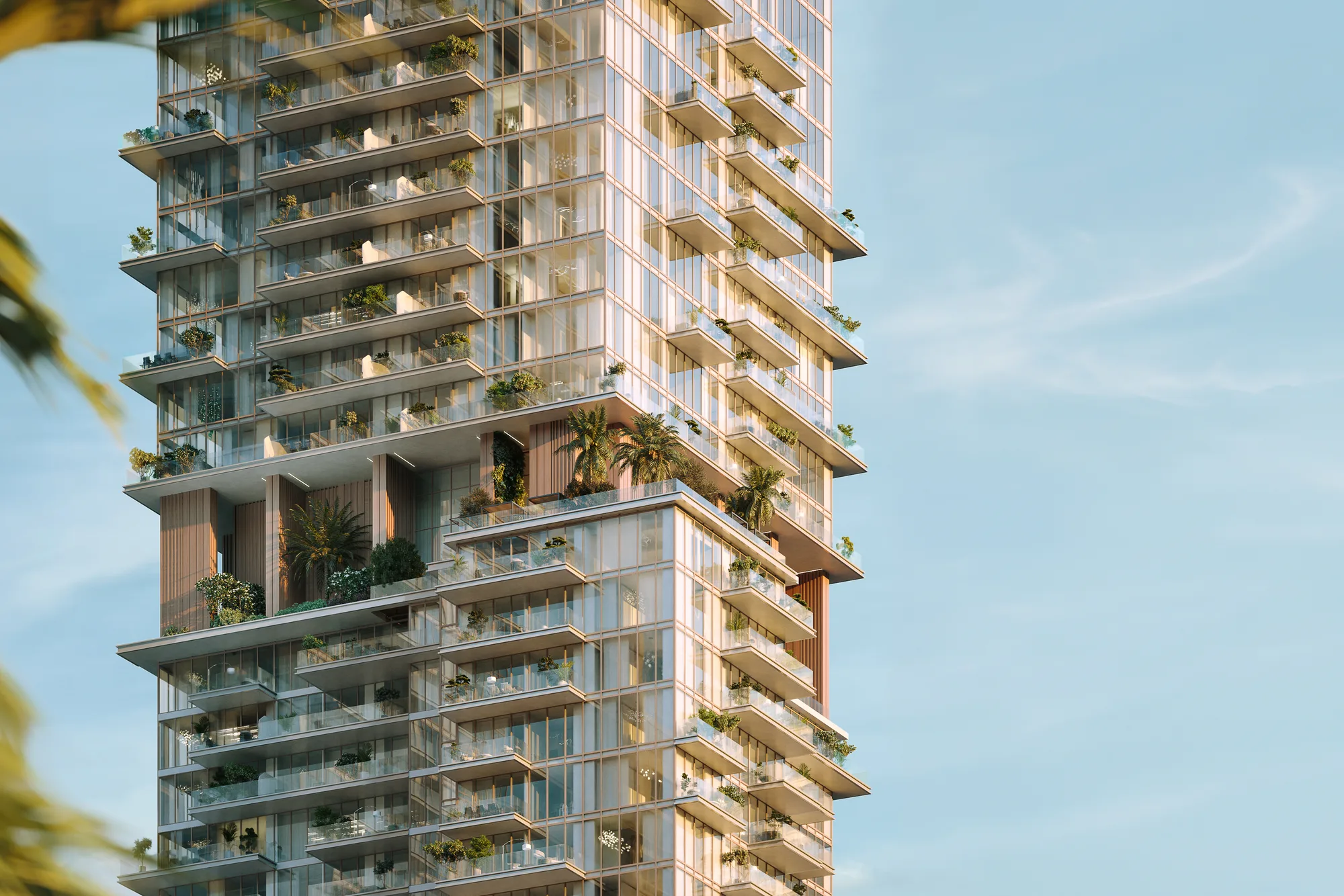Close-up of a tower façade: glazed terraces with planting around a mid-level garden terrace