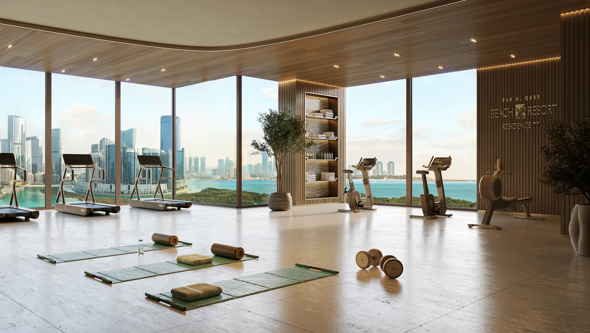 The panoramic gym: treadmills, bikes and mats with floor-to-ceiling views over the water and the city