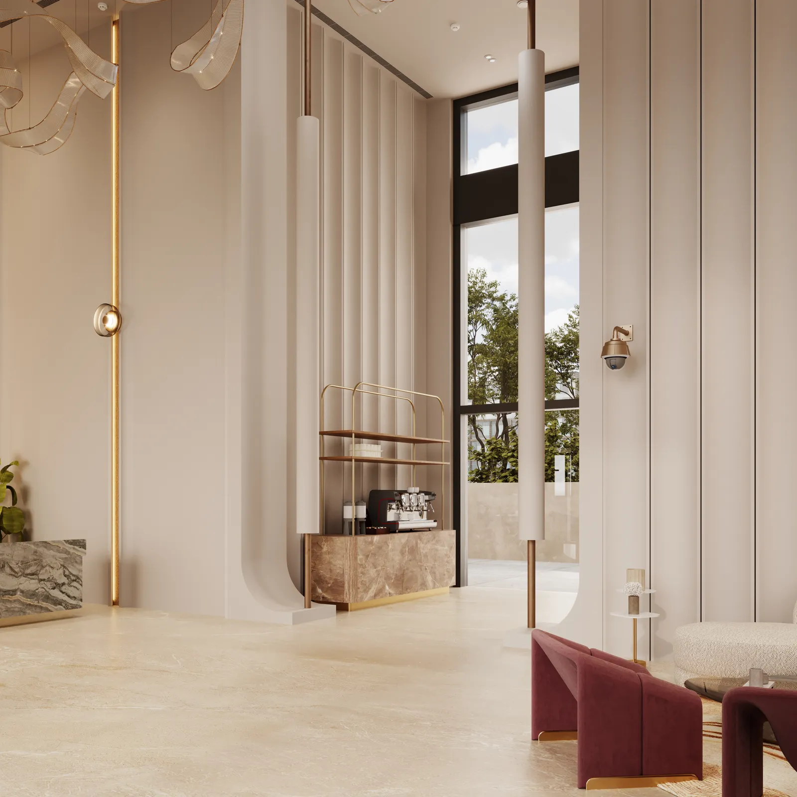The lobby coffee corner: an espresso machine on a marble counter with brass shelving, under the ribbon chandelier