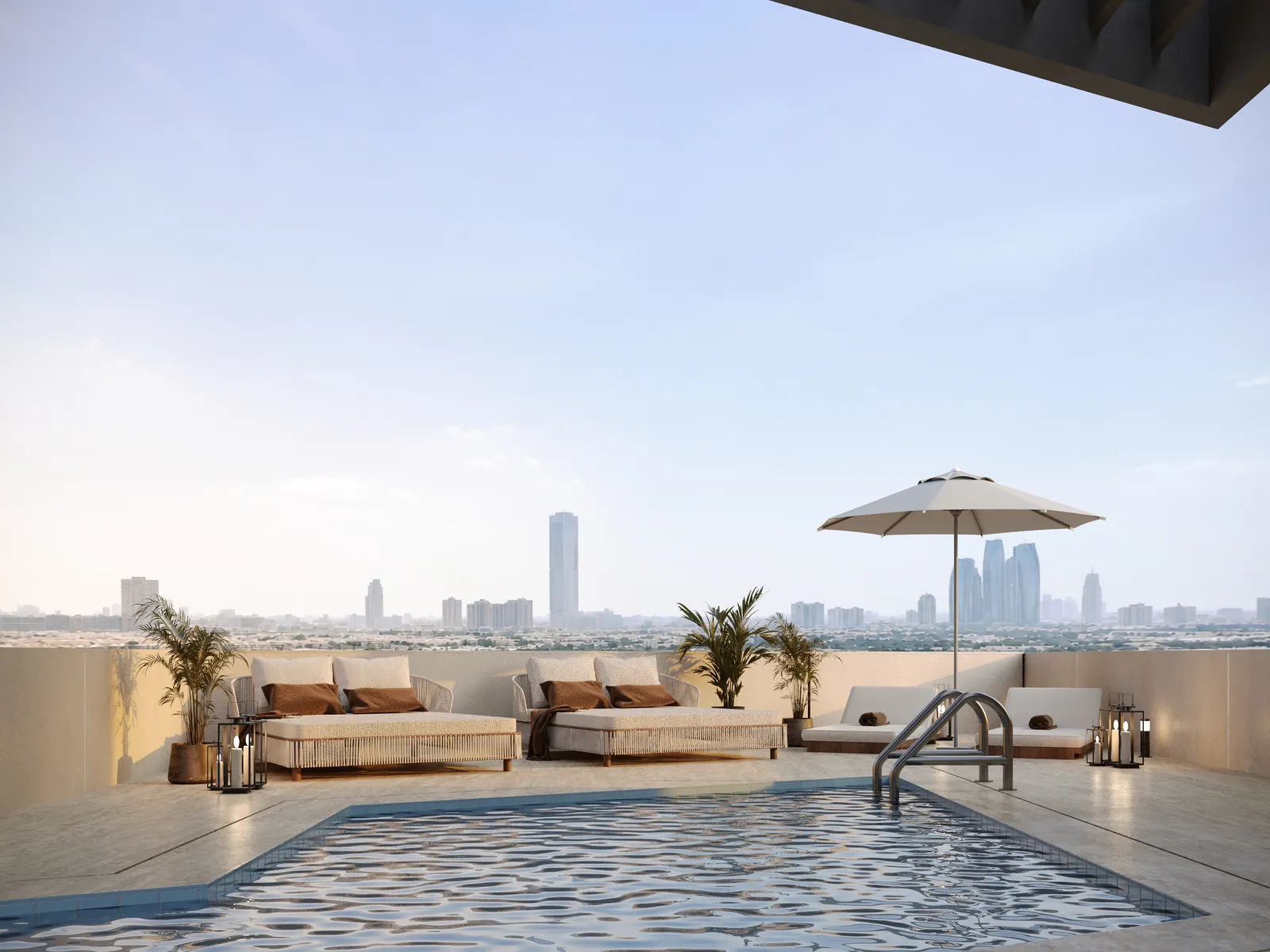 The 24th-floor pool: a swimming pool with rattan daybeds and a parasol, looking across to the Abu Dhabi skyline