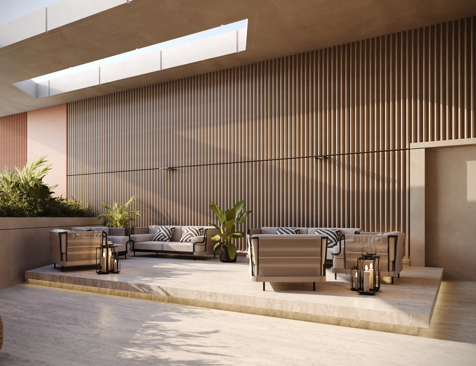 The covered outdoor lounge: grey outdoor sofas and lanterns against a slatted timber wall, with a terracotta wall and planting