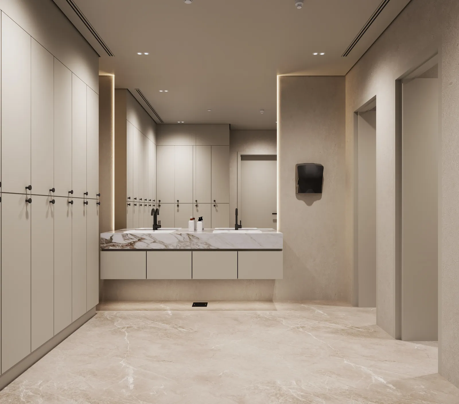 The changing room: lockers along one wall and a marble vanity with two black taps under a mirror