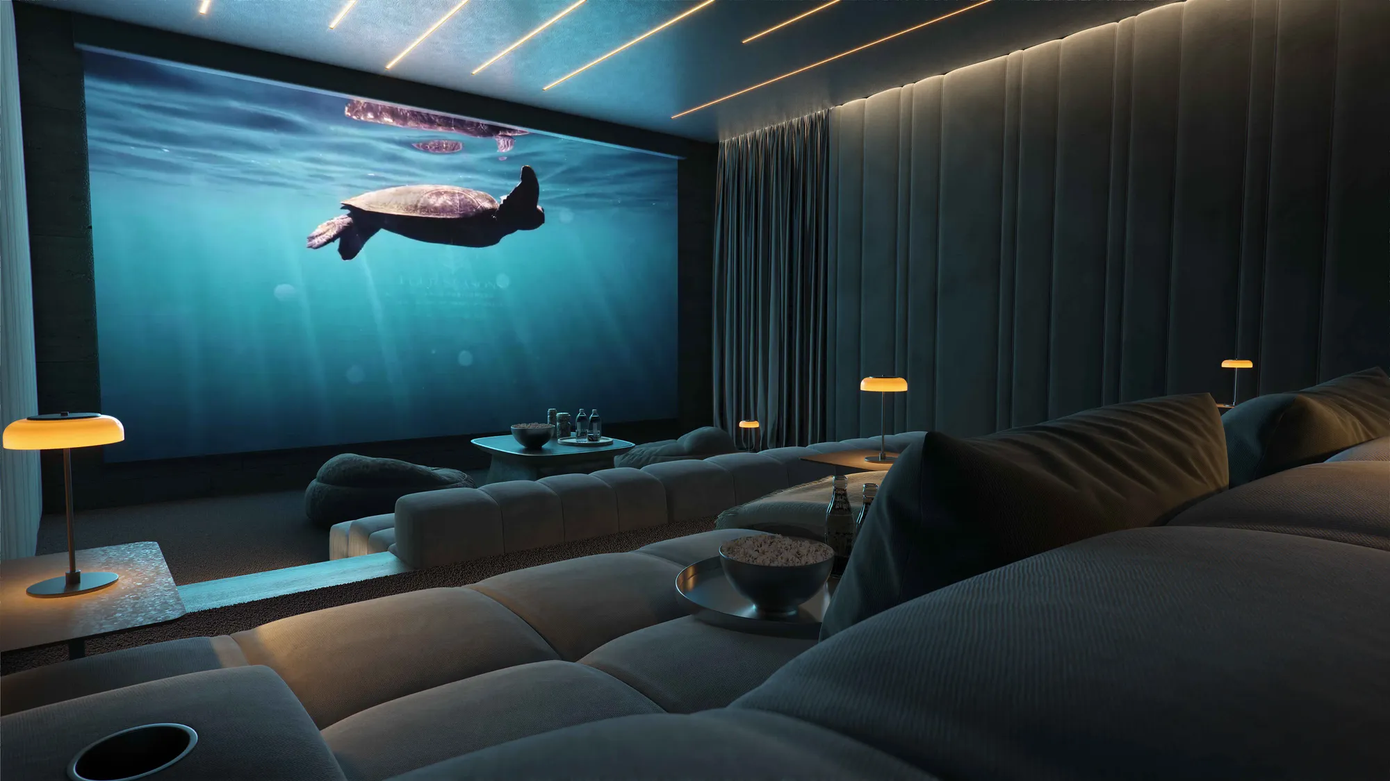 The private cinema of a six-bedroom villa: a wall-wide screen and tiered sofas