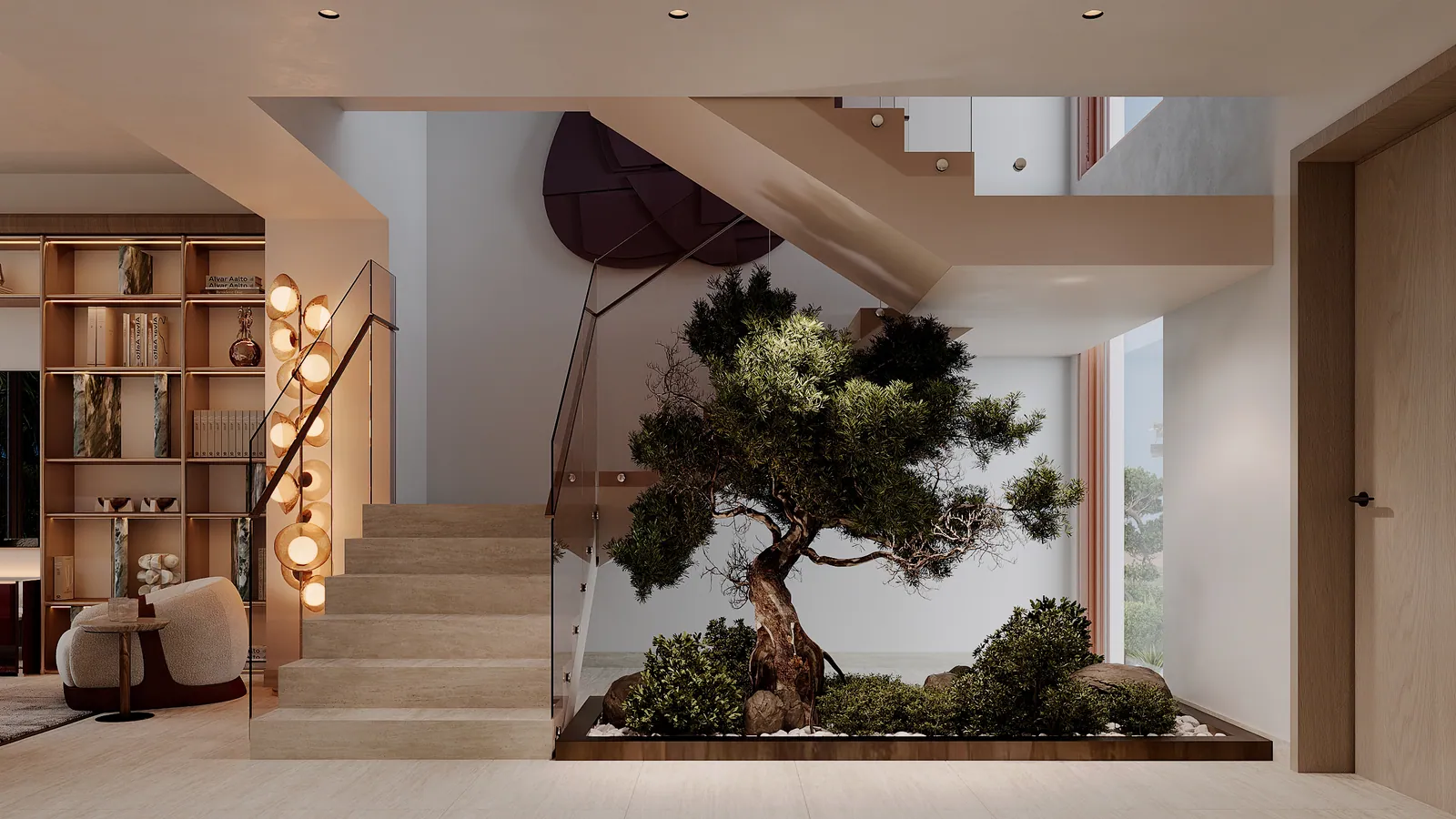 The entrance hall of a 3-bedroom duplex: a staircase beside a glazed courtyard with a tree, shelving and a sculptural lamp at left