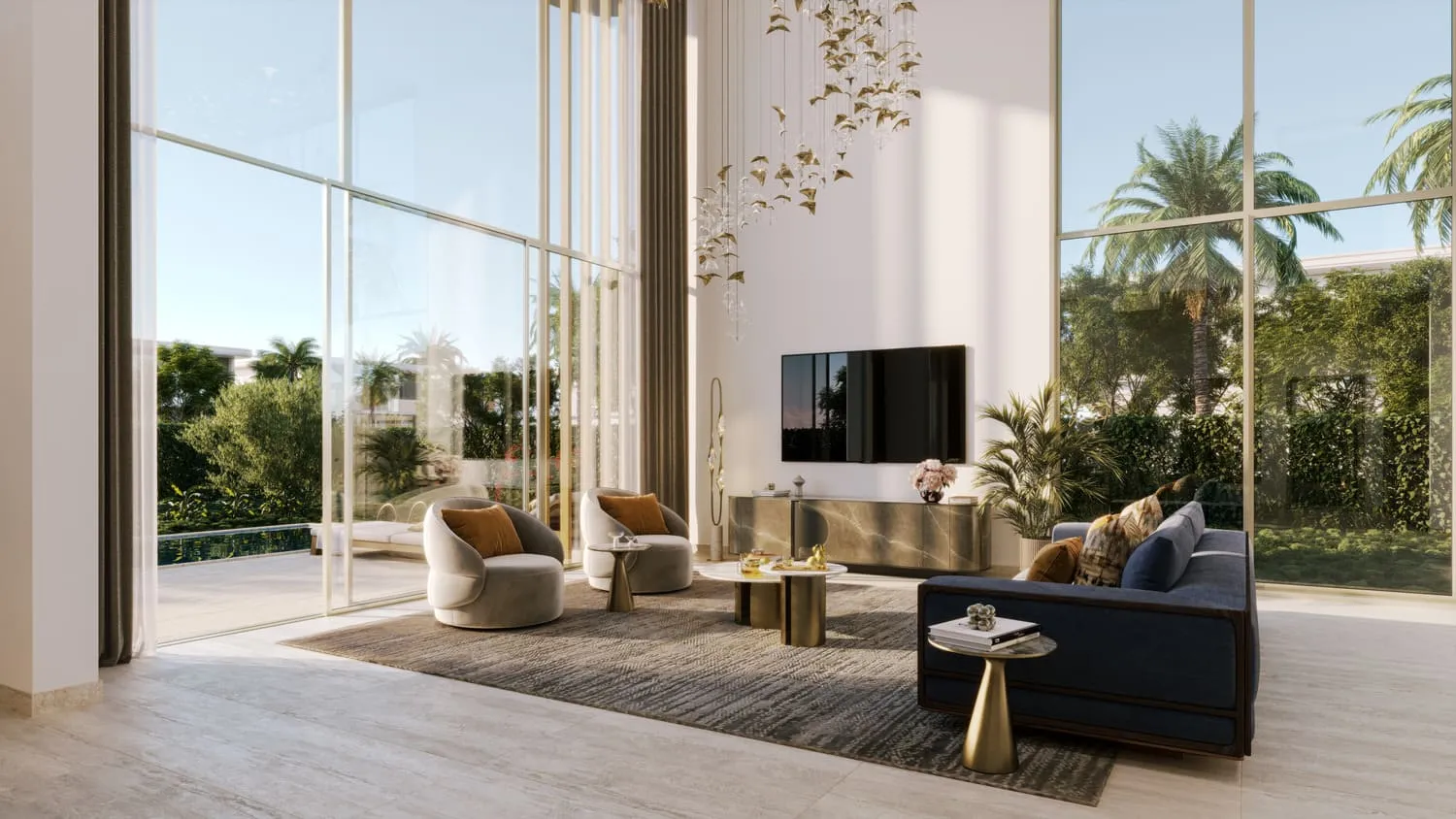 A living room with double-height glazing to the garden: a navy sofa, armchairs, a television wall and hanging pendant lights