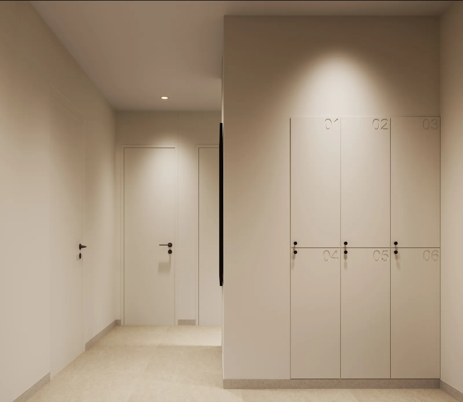 Changing-room lockers and a shower cubicle door in a cream corridor