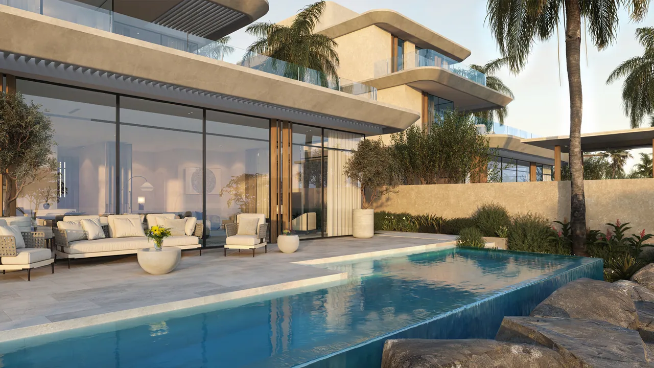 The pool terrace: an infinity pool and covered seating, the villa behind